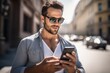 © drimerz - man wearing sunglasses using smartphone  in the street