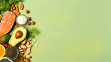 Fototapeta Kuchnia - Keto diet concept - salmon, avocado, eggs, nuts and seeds, bright green background, top view