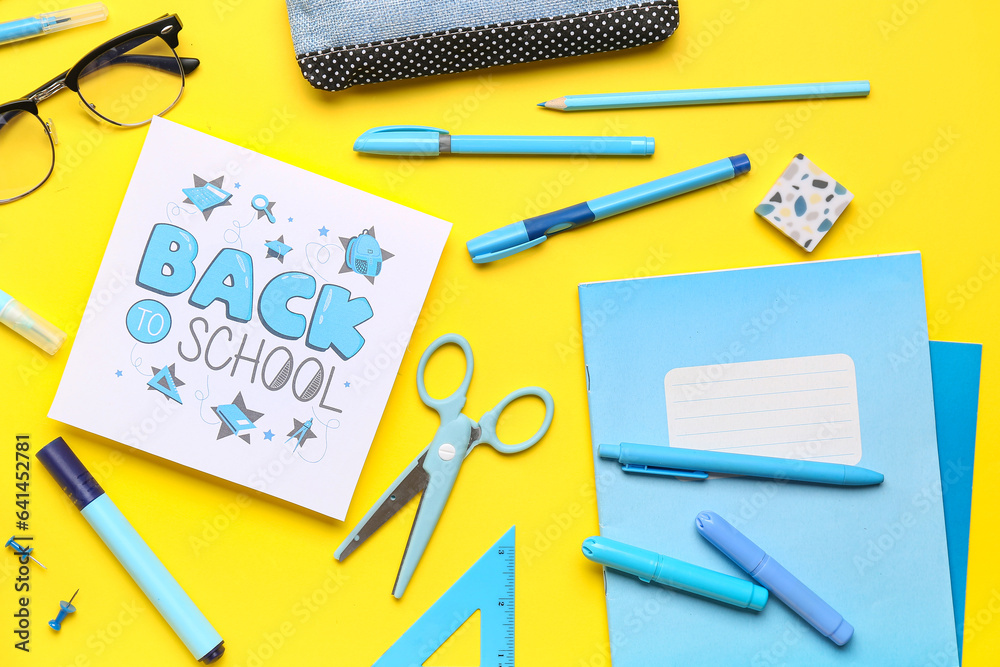 Card with text BACK TO SCHOOL, toy plane and different stationery on yellow background