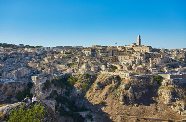 Wall Mural - Panoramic view of the ancient town of Matera Sassi di Matera in beautiful golden morning light at sunrise, Basilicata, Italy