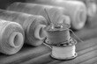Black and white sewing kit. bobbin threads,