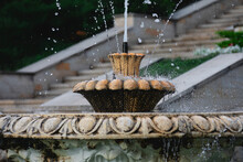 Fountain In The Park With Splashes