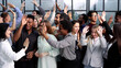 © Katsiaryna - Supporters clapping at political gathering in the office