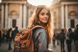 © amnaj - Attractive young female tourist is exploring new city. Female in hat with backpack traveling. Summer sunny lifestyle fashion portrait of young stylish hipster woman walking on the street.