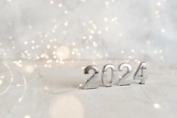 happy new year 2024 background new year holidays card with bright lights,gifts and bottle of hampagne