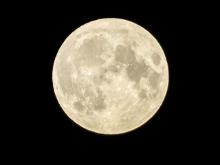 the moon seen at night from romania. full moon