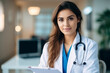© Keitma - Portrait of young female doctor studying at the hospital , woman doing medicine studies