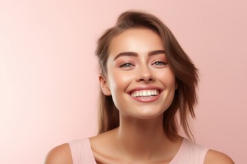 Wall Mural - Close-up portrait photography of a grinning girl in her 20s covering his mouth against a pastel pink background. With generative AI technology