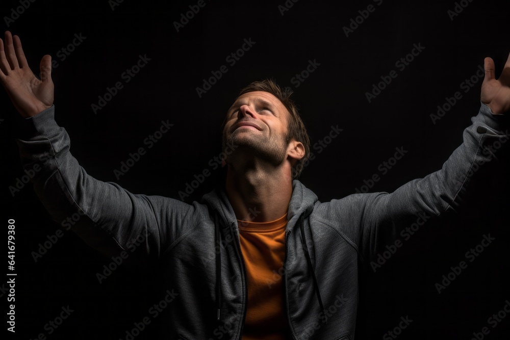Lifestyle portrait photography of a beautiful boy in his 30s extending ...