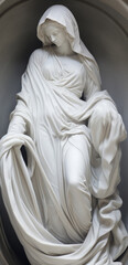 Artistic marble art sculpture, female slim body and ruffled silk dress, falling fabric. Beautiful art of a female figure.