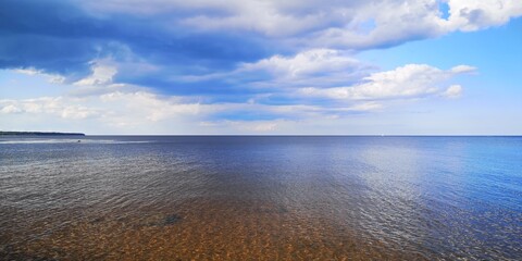 Wall Mural - clouds over the lake