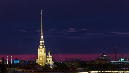 Wall Mural - Timelapse captures the nocturnal grandeur of the illuminated Peter and Paul Fortress, St. Petersburg's original citadel, as viewed from a rooftop. Founded by Peter the Great. Saint Petersburg, Russia