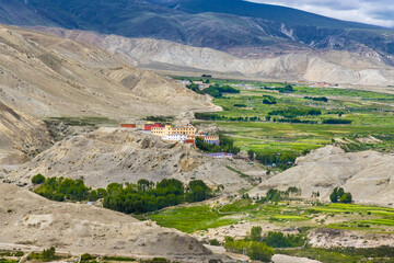 Landscape view of Kingdom of Lo Manthang with Green Tibetan Desert Background in Mustang of Nepal