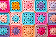 Granny square pattern. Multicolor crochet flowers. Top View Colorful illustration