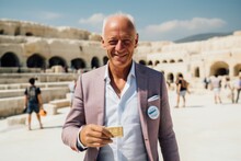 Medium Shot Portrait Photography Of A Jovial Mature Man Holding A Credit Card Donning An Ornate Brooch At The Pamukkale In Denizli Turkey. With Generative AI Technology