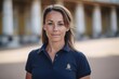 Lifestyle portrait photography of a satisfied girl in her 40s wearing a sporty polo shirt at the buckingham palace in london england. With generative AI technology