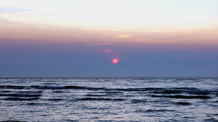 Wall Mural - Scenic sunset over the sea. Poland seaside, Leba village and beach. Seascape