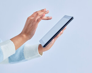 Poster - Hands, tablet and person on studio for social media, reading ebook and search website on gray background. Closeup, model and digital technology for connection, download and scroll online shopping app