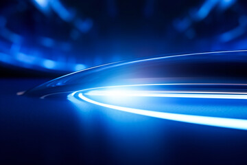 Poster - A blue abstract space with curved light beams in it. Futuristic technology concept.