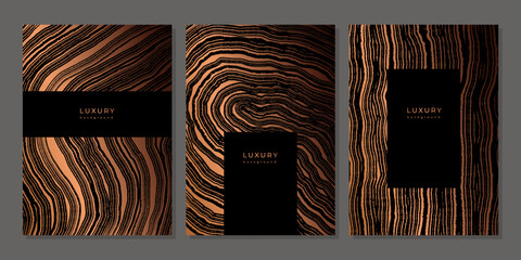 Set of templates. Luxury golden background with wood annual rings texture. Banner with tree ring pattern. Stamp of tree trunk in section. Wooden concentric circles. Black and bronze marble background