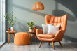 Scandinavian soft peach fuzz armchair near wall in living room in warm fall orange and teal coloured. Modern interior. Generative AI.
