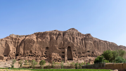 Buddhas of Bamiyan, where there were two 6th-century monumental statues carved into the side of a cliff, in the Bamyan valley of central Afghanistan. Now only holes remain.