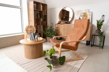 Sticker - Interior of living room with coffee table and armchair