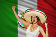 © Gener Vázquez - Mexicana mujer emocionada gritando por día de la independencia de México viva con sombrero	bandera mexicana