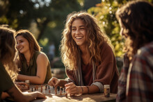 A Group Of Friends Gathers At A Local Park To Play Board Games, Turning The Outdoors Into A Dynamic And Inclusive Third Space. Generative Ai.