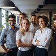 © Fred - portrait of a diverse and inclusive team of people in a modern office with daylight wooden furniture