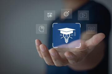 E-learning graduate certificate program concept. Internet education course degree, study knowledge, creative thinking idea, problem-solving solution. Man hands showing graduation hat in light bulb.