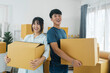 © ijeab - Asian young happy new married couple moving to their new house or real estate.