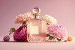 Perfume bottle on pink background with flowers. Summer floral fragrance