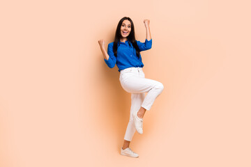 Wall Mural - Full length photo of overjoyed lady wear stylish smart casual blue outfit rejoice black friday sale isolated on beige color background