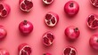 Fresh pomegranate pattern, top view, flat lay, on pink background.