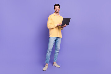 Aufkleber - Full body photo of young man it specialist holding netbook project manager create high income startup isolated on violet color background