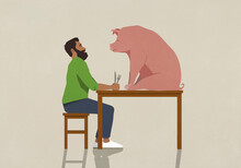 Man With Fork And Knife Staring At Pig On Dining Table
