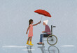 © fStop - Caring girl holding umbrella over senior woman in wheelchair, protecting her from rain