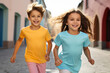 © Keitma - Young boy kid and girl model cheerful playing running together wearing colorful empty blank t-shirt