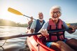 © Jorge Ferreiro - happy retired couple enjoying the travel moment paddling on the river