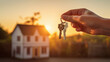 © Linus - A Hand Holds Keys in Front of Our New House, Unlocking the Doors to a Bright Future Filled with Dreams and Possibilities