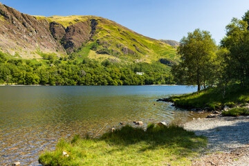 Sticker - Shoreline of a picturesque lake and mountains on a hot summers day (Buttermere, Lake District)