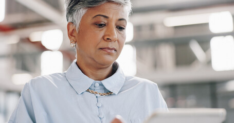 Poster - Senior business woman, reading and tablet for notes, ideas and thinking with planning schedule in office. Mature ceo lady, leader and digital. touchscreen with email notification, networking or app