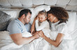 © Wesley/peopleimages.com - Top view, family and parents with child in bed for bonding, healthy relationship and sleeping at home. Morning, love and above of mother, father and girl in bedroom asleep for comfort, cuddle or love