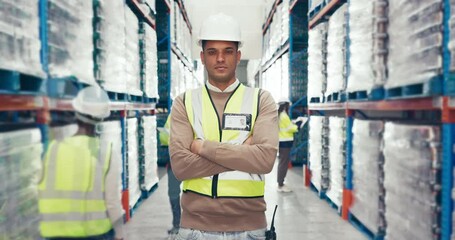 Canvas Print - Industry, crossed arms and man in a busy warehouse for inventory, stock check or distribution. Engineering, confidence and portrait of serious Mexican male industrial worker at a logistics factory.