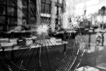 Black And White Tone, Blur City Street Reflection On Broken Crack Glass Window.