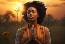 African American Woman Praying In Nature 1