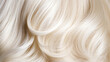 © dinastya - Texture of beautiful shining blonde white hair. Backdrop with perfect blonde waved hair.