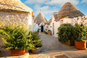 Characteristic Alberobello trullo by day