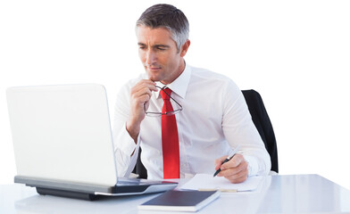 Poster - Digital png photo of caucasian businessman looking at laptop on transparent background